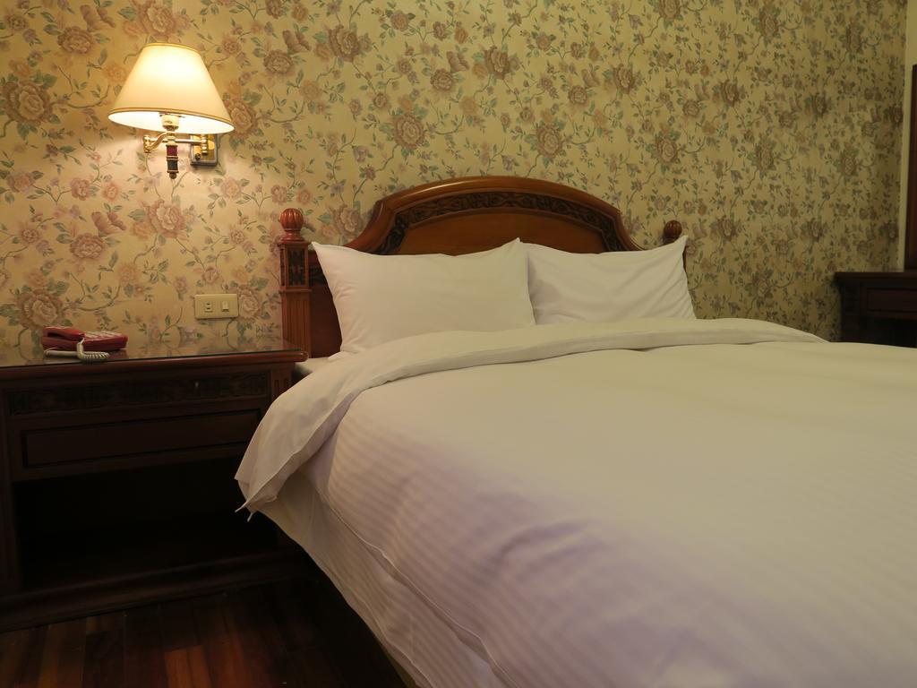 Champagne Hotel Jiaoxi Room photo